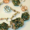 Peach Cuboctahedron Necklace